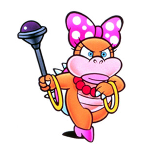 Image of Wendy O'Koopa from the Mario Brothers franchise by Nintendo, holding a bit scepter with a ball on the end. Wendy wears a pink polka dotted bow in her hair, pink shoes, a necklace of big red beads, and gold rings around her wrists. She is frowning.