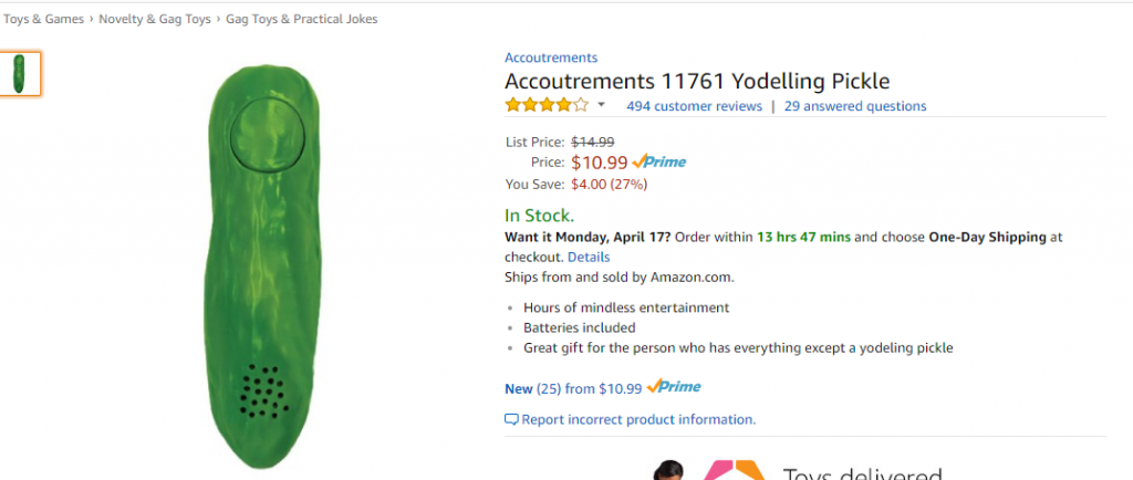 Screenshot for the Amazon page or the Accoutrements Yodelling Pickle - a plastic pickle is the product photo, and it has an upraised button on one end, with holes at the other end where the speaker presumably sits.